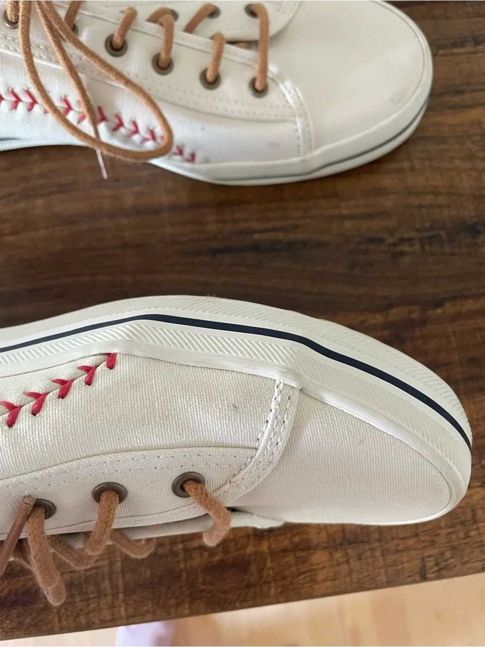 Keds White Canvas Sneakers with Red Stitching and Tan Laces